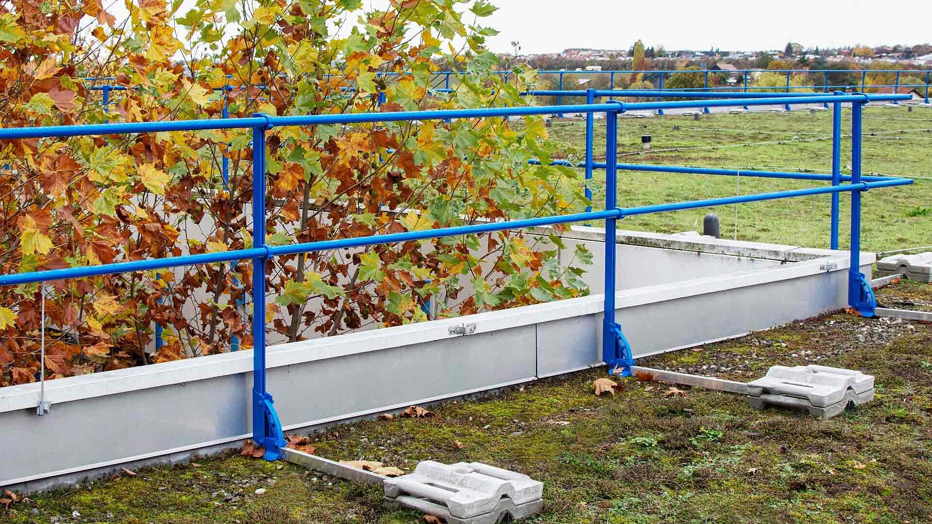 Protective railing secures against falls