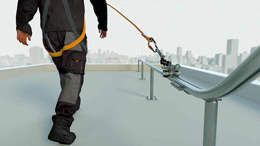 Man with fall protection preventing pendulum fall